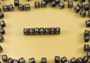 The word penalty on wood background