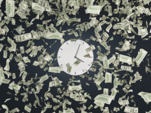 Clock and falling dollars banknotes on black background